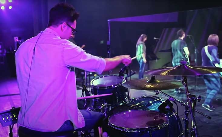 Gabe Helguera performing in church