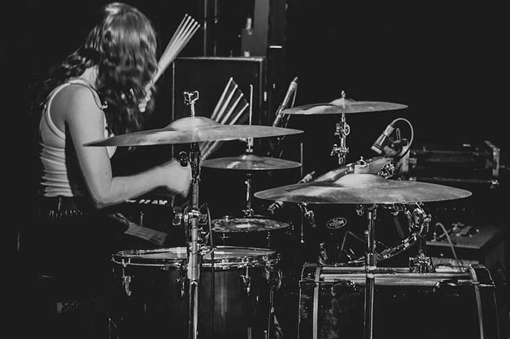 Mikaela Swan drumming
