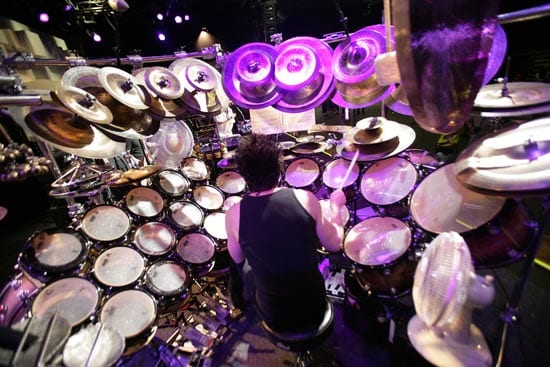 Overhead view of Terry Bozzio at the centre of his Big Kit, surrounded by dozens of tuned drums and cymbals