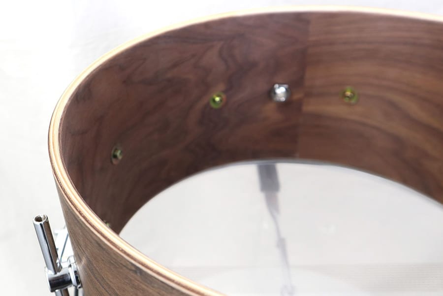 Inside the Canopus BA-1470 walnut/birch shell, showing the walnut grain and the bearing edge