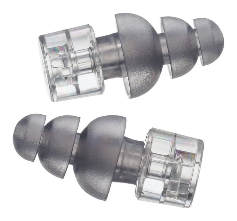 A pair of Etymotic ER20XS musicians' earplugs with clear filter stems and grey triple-flange tips