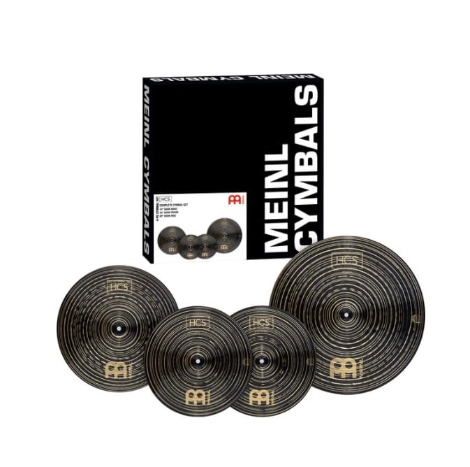 The Meinl HCS Dark Complete Cymbal Set: 14-inch hi-hats, a 16-inch crash and a 20-inch ride in front of the black Meinl Cymbals box