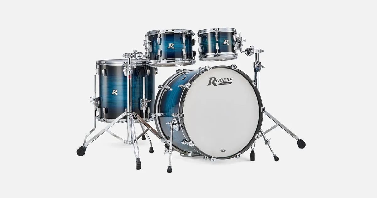 A four-piece Rogers R-Series kit in a blue burst lacquer finish with two rack toms, a floor tom and a bass drum with a Rogers logo head